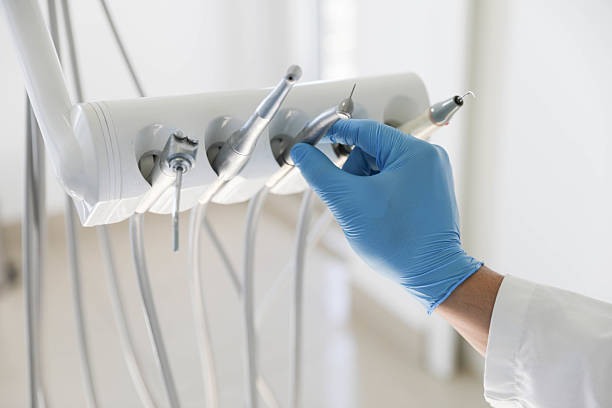 Professional Emergency Dentist technician working in Alamo, TX